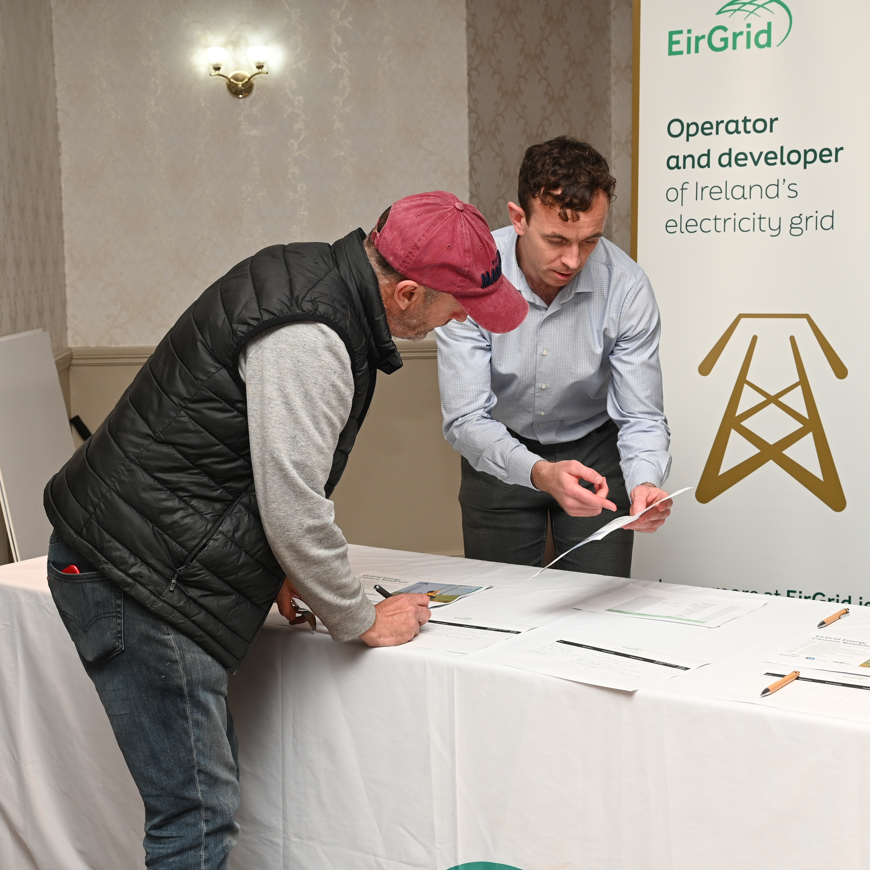 A member of the public visits an EirGrid information stand